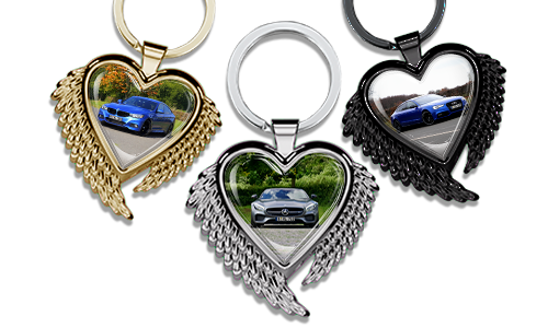 Heart-shaped keychain with wings and a photo of your car