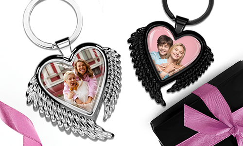 Heart-shaped keychain with wings and a photo with your sister