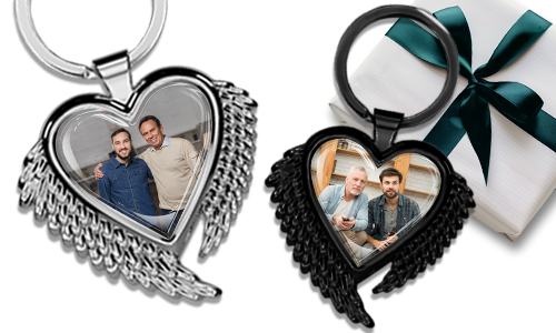 Heart-shaped keychain with wings and a photo of your son