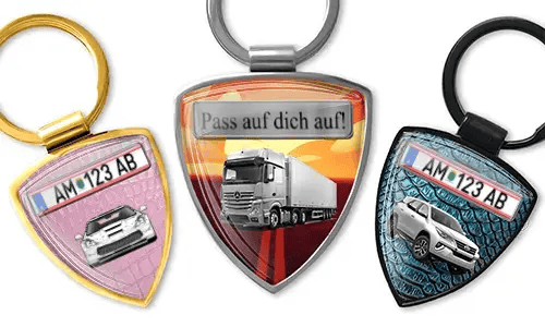 Shield-shaped photo keychain with car and truck designs