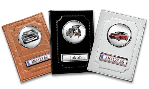 Three personalized car document holders with custom designs