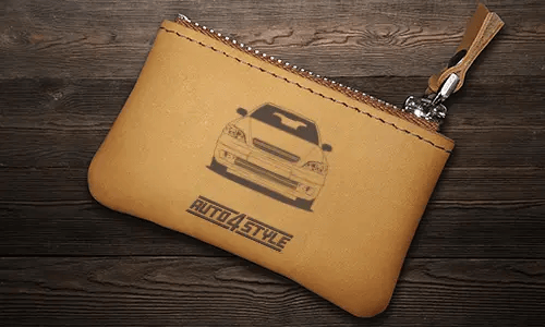 Brown leather key pouch with zipper, printed car and plate 