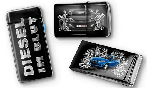 Three black car-themed lighters with metallic accents. One has 