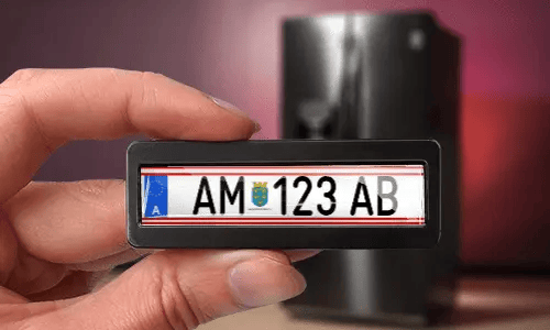 license plate magnet in hand