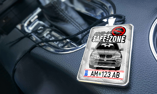 Auto-Safezone-Anhänger mit Weiß Leder Hintergrund im Wagen Auto-Safezone-Anhänger