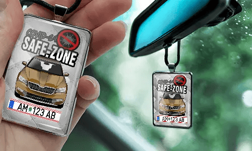 Auto-Safezone-Anhänger mit Weiß Leder Hintergrund nd Lederkette im Wagen Safezone-Anhänger