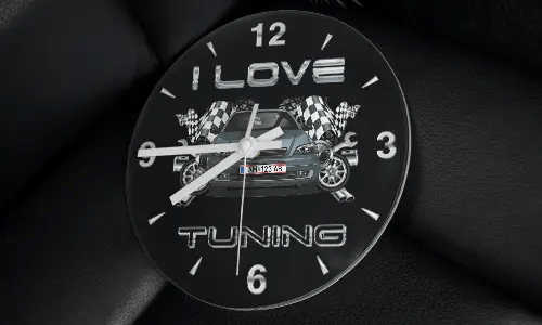 Wall clock with modified car, racing flags, wheels, and I LOVE TUNING text on black background