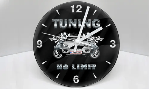 Wall clock with stylized car, checkered flags, and metallic TUNING NO LIMIT text on black background