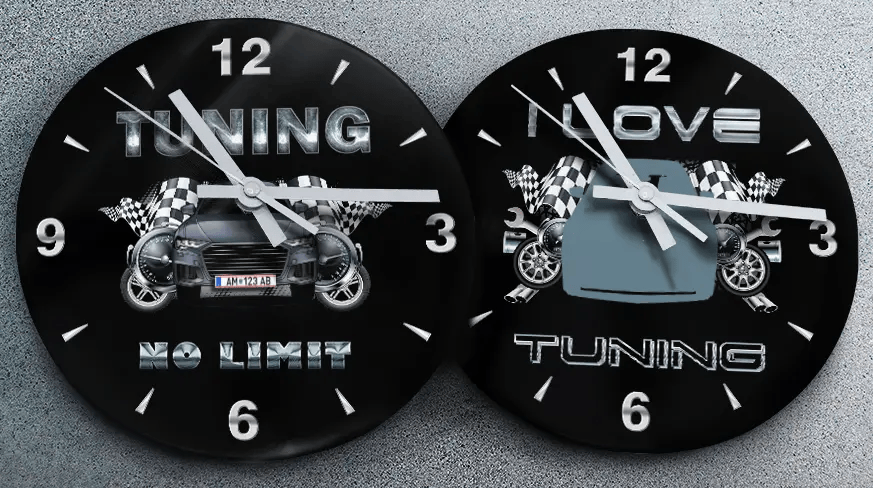 Two racing-themed wall clocks: left with black car and TUNING NO LIMIT text, right with blue car and MOVE TUNING text